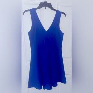 Royal blue romper with small cut out in front